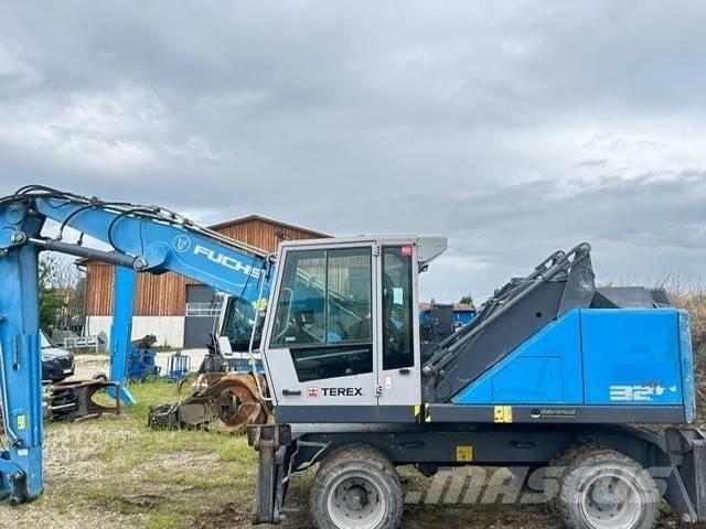 Fuchs MHL 320 Gravemaskiner for avfallshåndtering