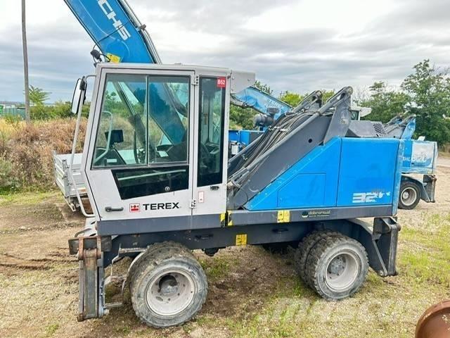 Fuchs MHL 320 Gravemaskiner for avfallshåndtering