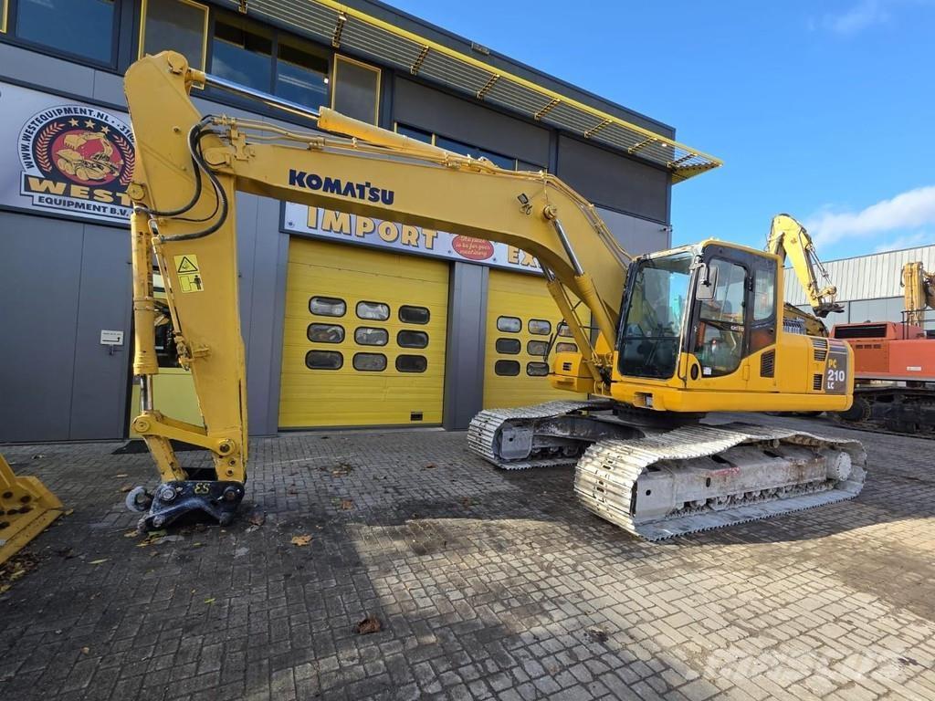 Komatsu PC210LC-8 Beltegraver