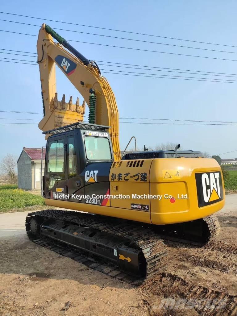CAT 323 Beltegraver