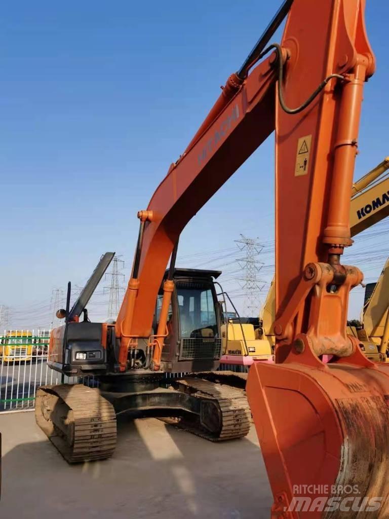 Hitachi ZX 210 Beltegraver
