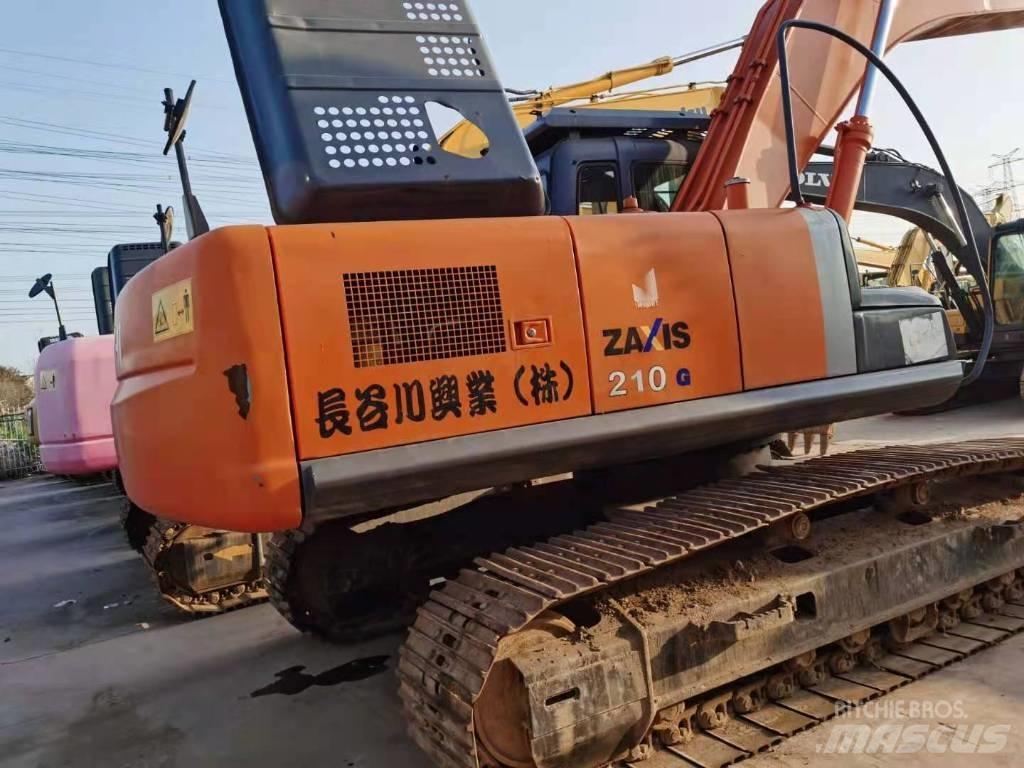 Hitachi ZX 210 Beltegraver