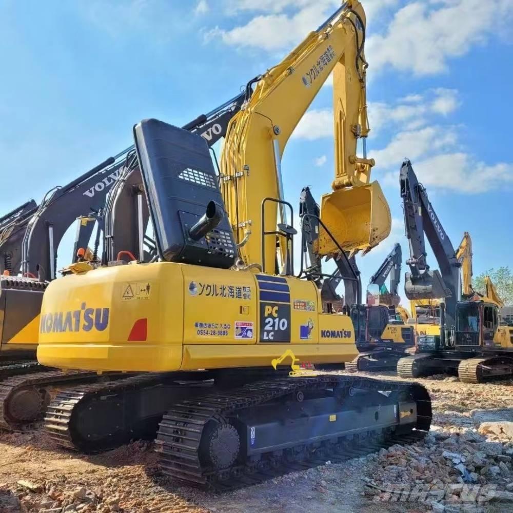Komatsu PC 210-8 Beltegraver