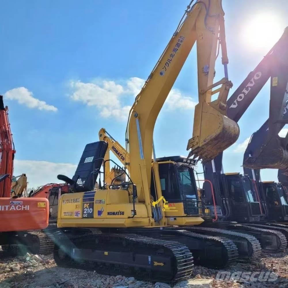 Komatsu PC 210-8 Beltegraver