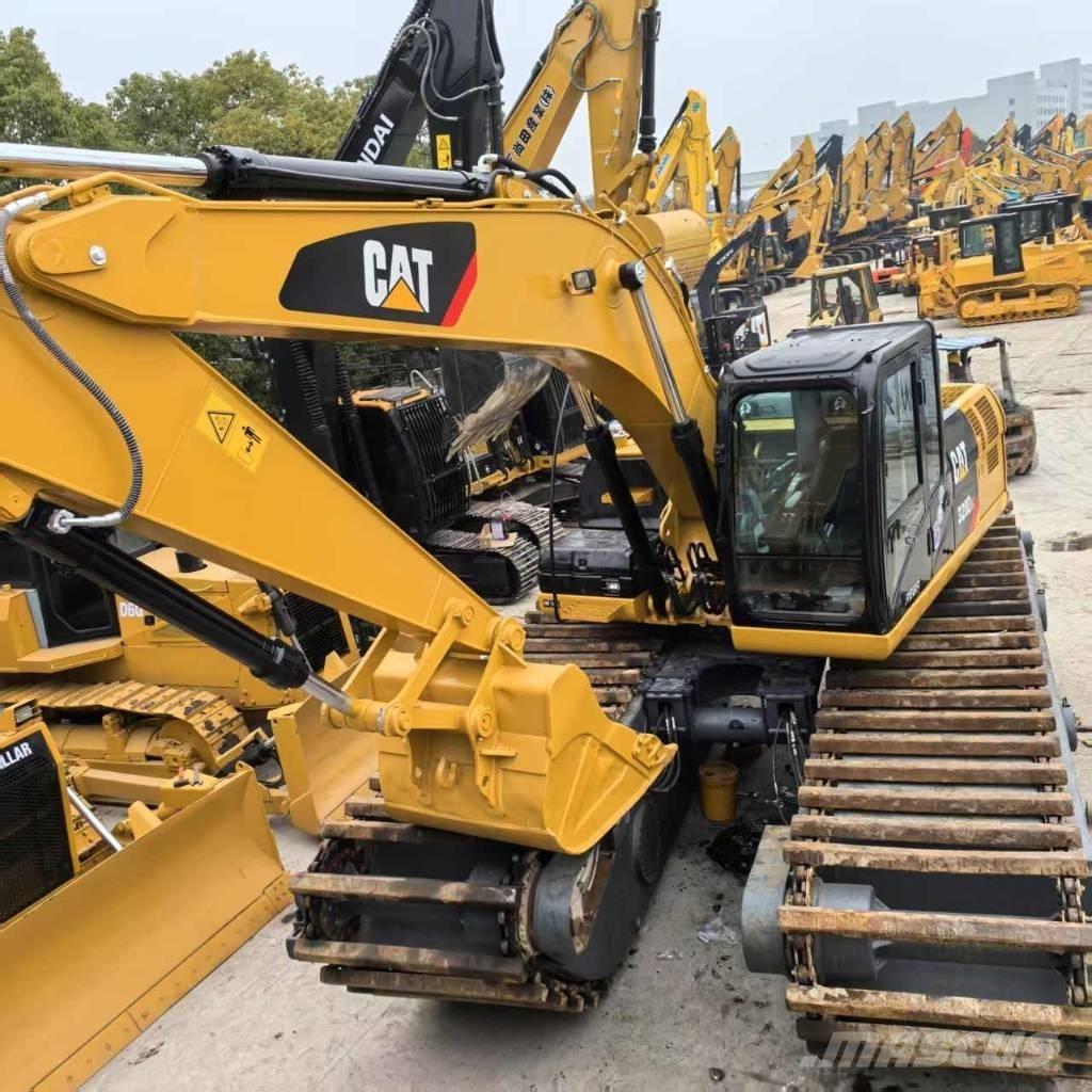 CAT 320 D Amfibiske Gravemaskiner