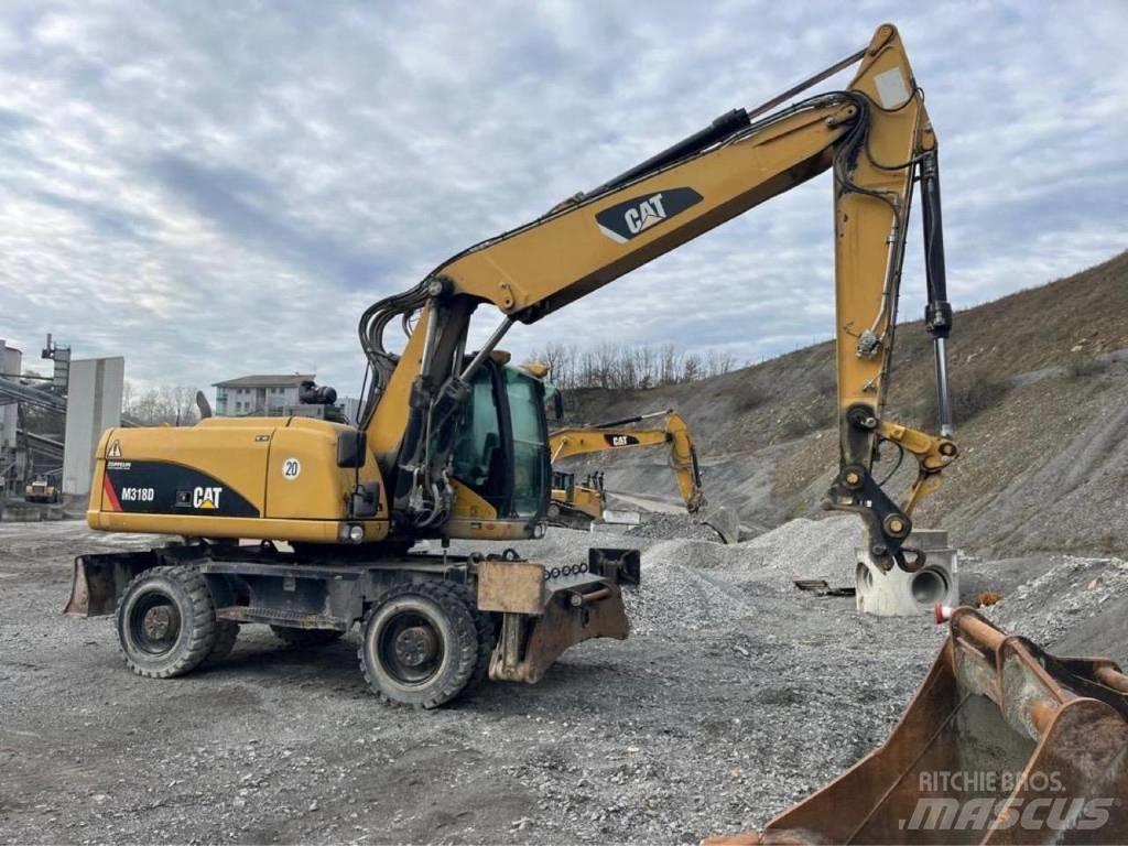 CAT M318D Hjulgravere