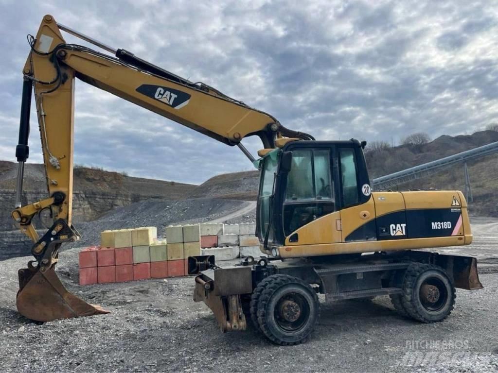 CAT M318D Hjulgravere