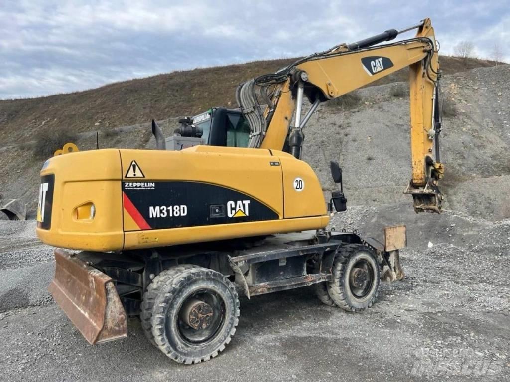 CAT M318D Hjulgravere