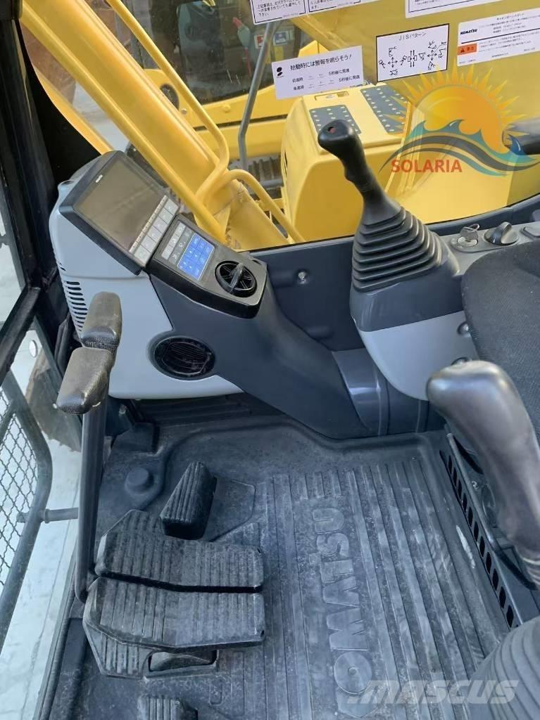 Komatsu PC 220 Beltegraver