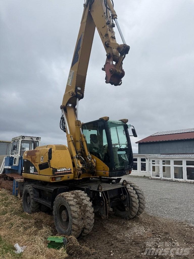 CAT M 313 C Hjulgravere