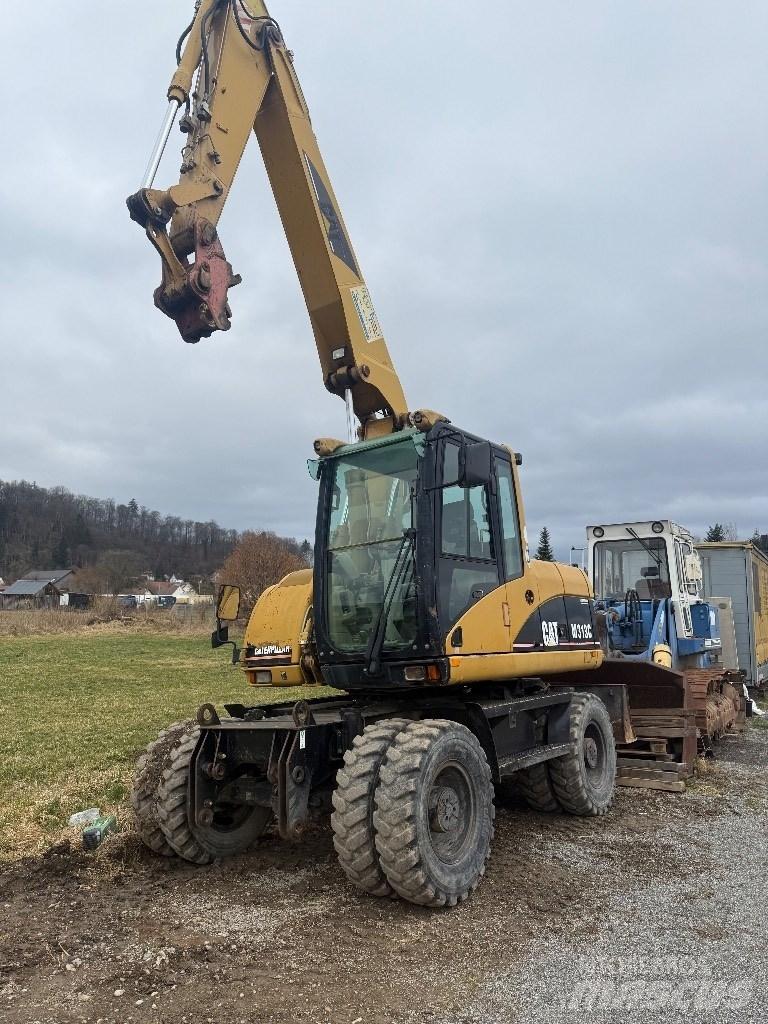 CAT M 313 C Hjulgravere
