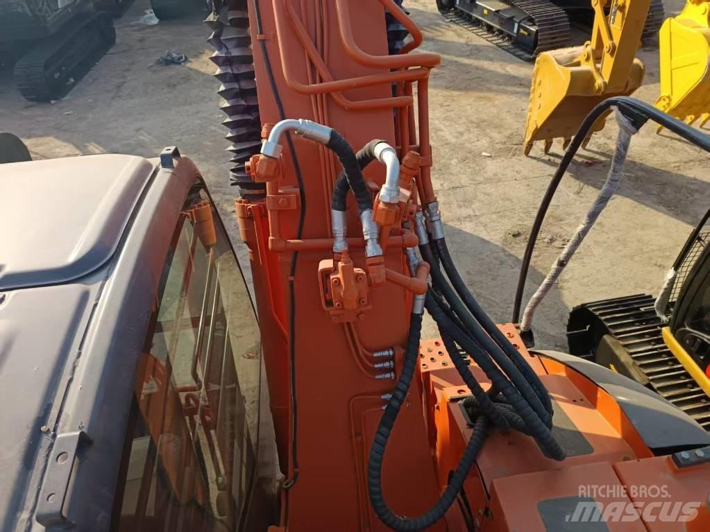 Hitachi ZX135 Beltegraver