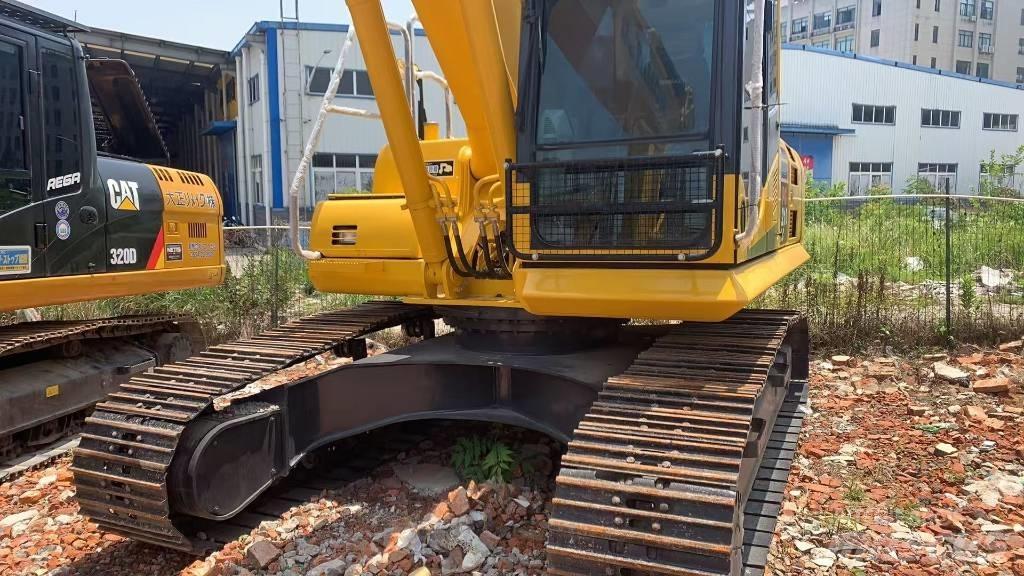 Komatsu PC 210 Beltegraver