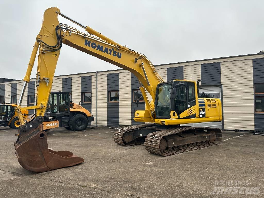 Komatsu PC210LC-11 Beltegraver