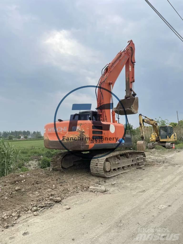 Hitachi ZX 210 K Beltegraver