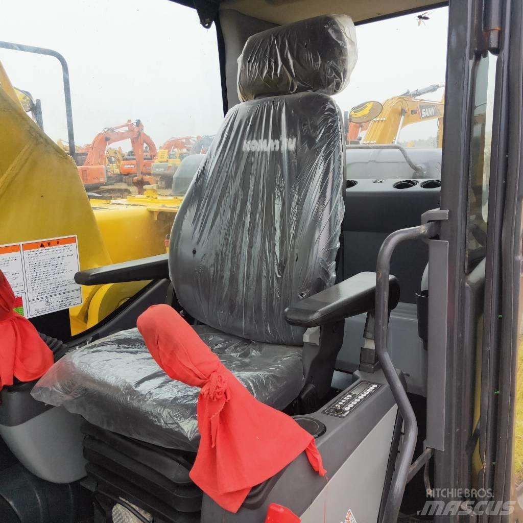 Komatsu PC200-8 Beltegraver