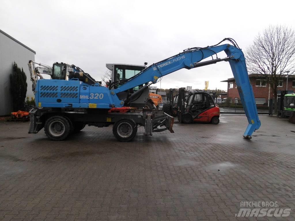 Fuchs MHL 320 Gravemaskiner for avfallshåndtering