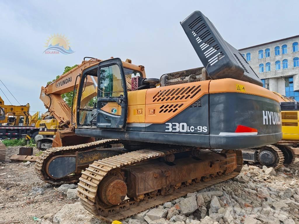 Hyundai R330LC-9 Beltegraver