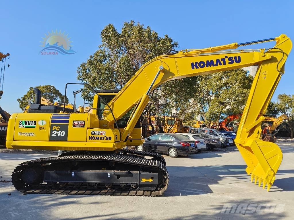Komatsu PC 210-8 Beltegraver
