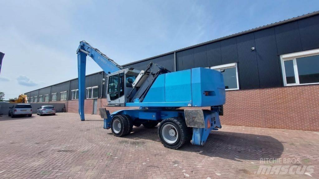 Fuchs MHL360 Gravemaskiner for avfallshåndtering