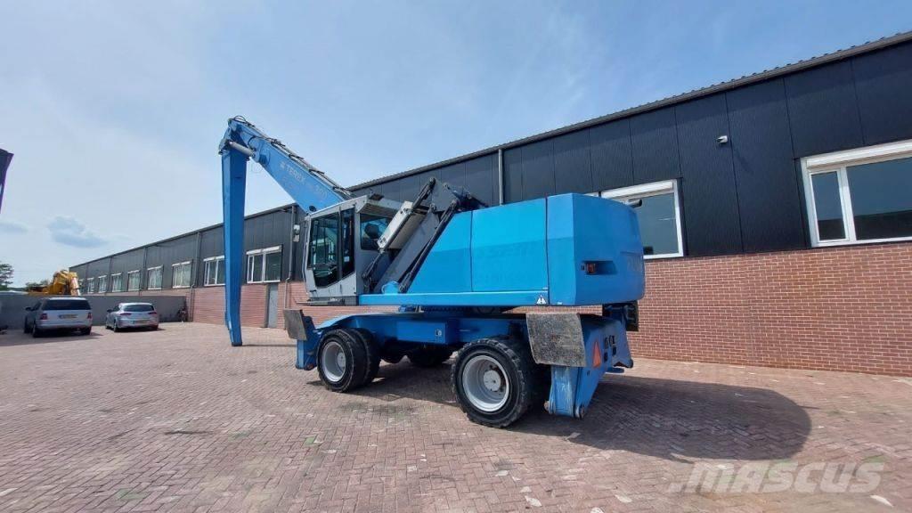 Fuchs MHL360 Gravemaskiner for avfallshåndtering