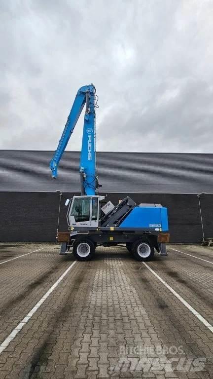 Fuchs MHL360 Gravemaskiner for avfallshåndtering