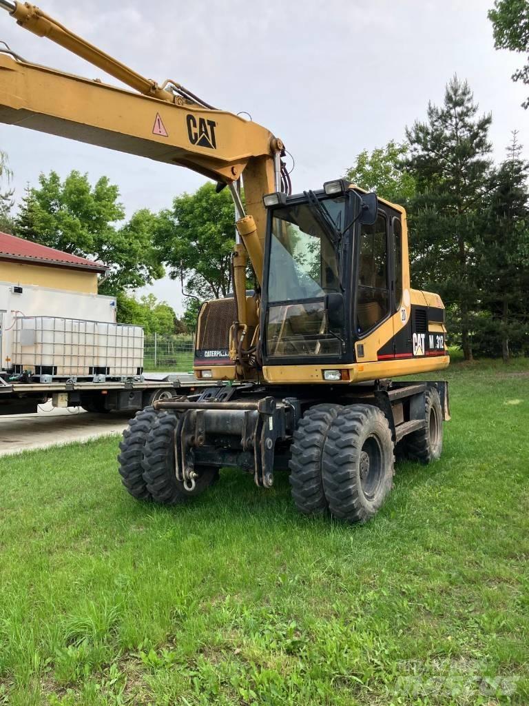 CAT M 312 Hjulgravere
