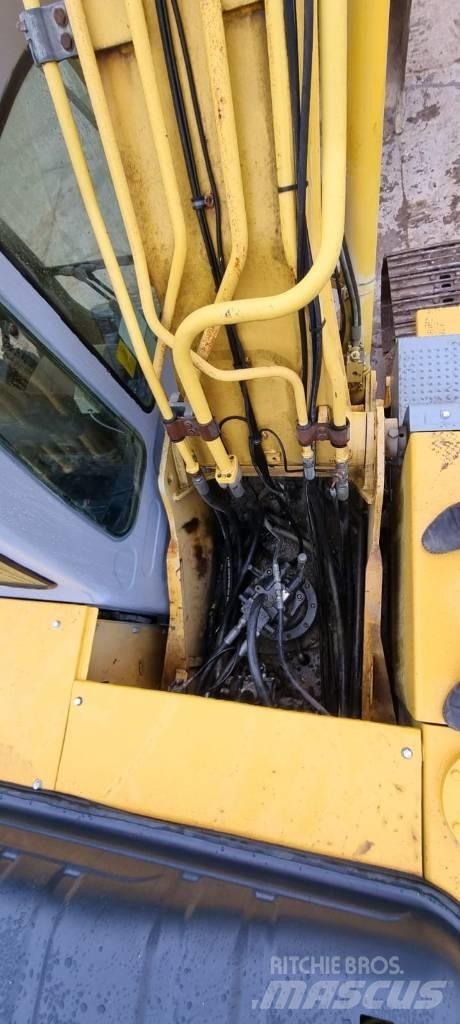 New Holland 215 B Beltegraver