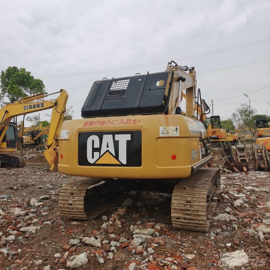 CAT 323DL Beltegraver