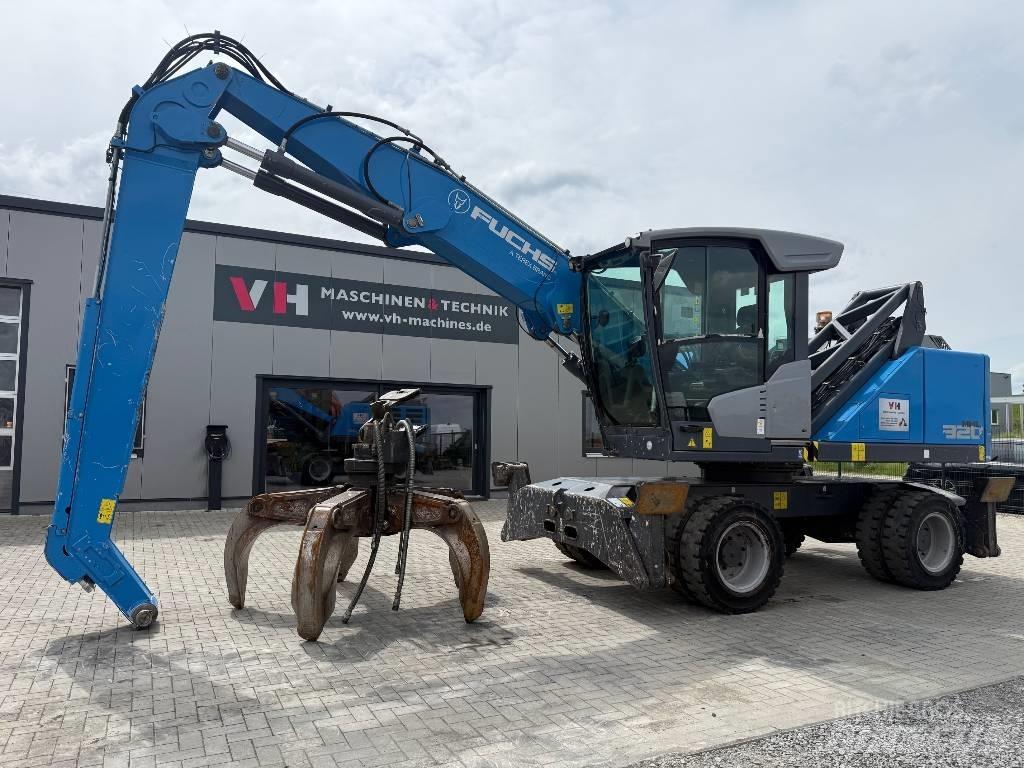 Fuchs MHL 320 Gravemaskiner for avfallshåndtering
