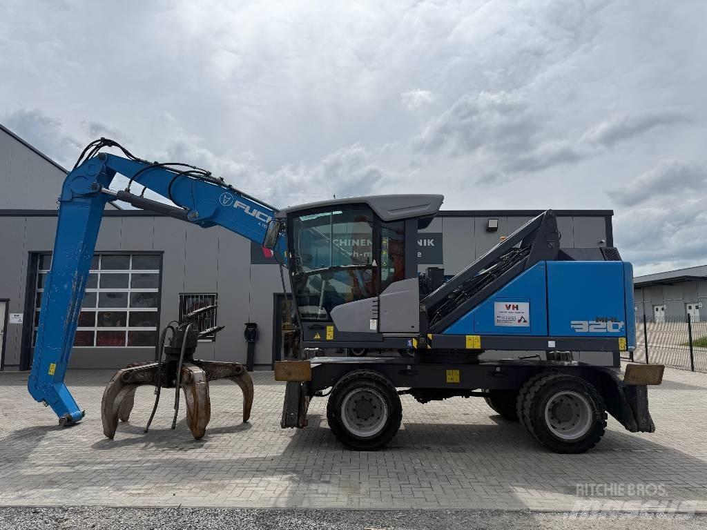 Fuchs MHL 320 Gravemaskiner for avfallshåndtering