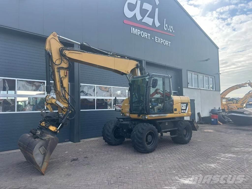 CAT M313D Hjulgravere