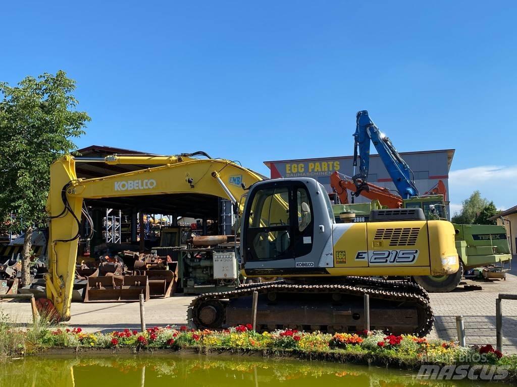 New Holland E 215 Beltegraver