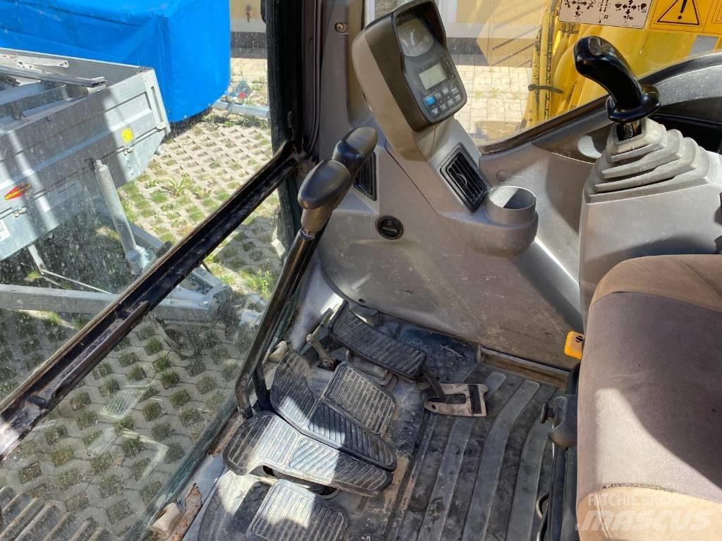 New Holland E 215 Beltegraver