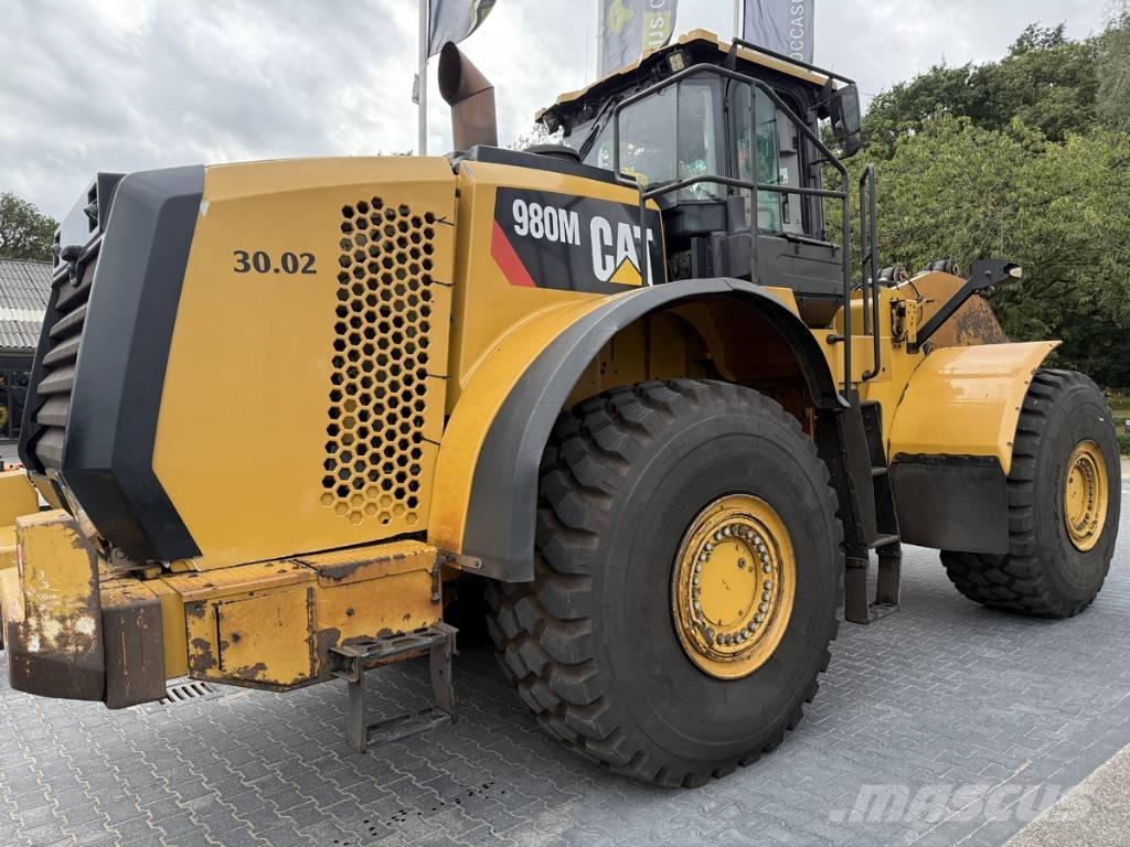 CAT 980M shovel + Bak Hjullastere