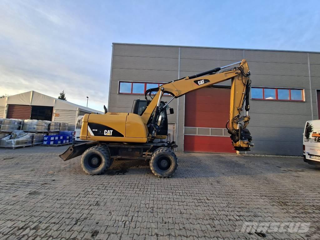 CAT M 313 D Hjulgravere