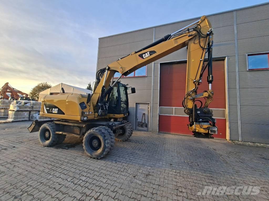 CAT M 313 D Hjulgravere