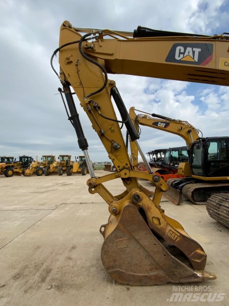 CAT 323 Beltegraver