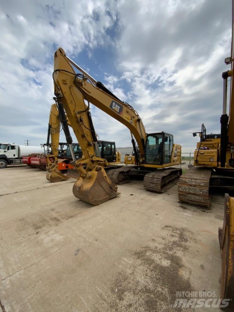CAT 323 Beltegraver