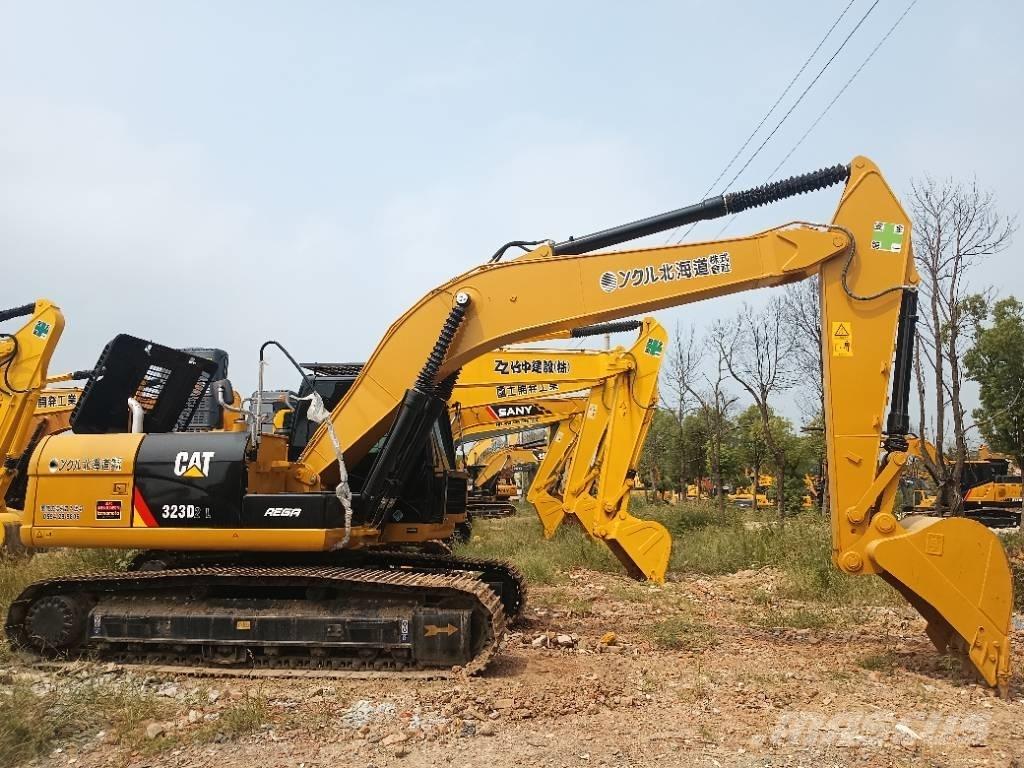 CAT 323D2 Beltegraver