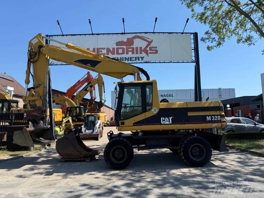 CAT M320 2001 Hjulgravere