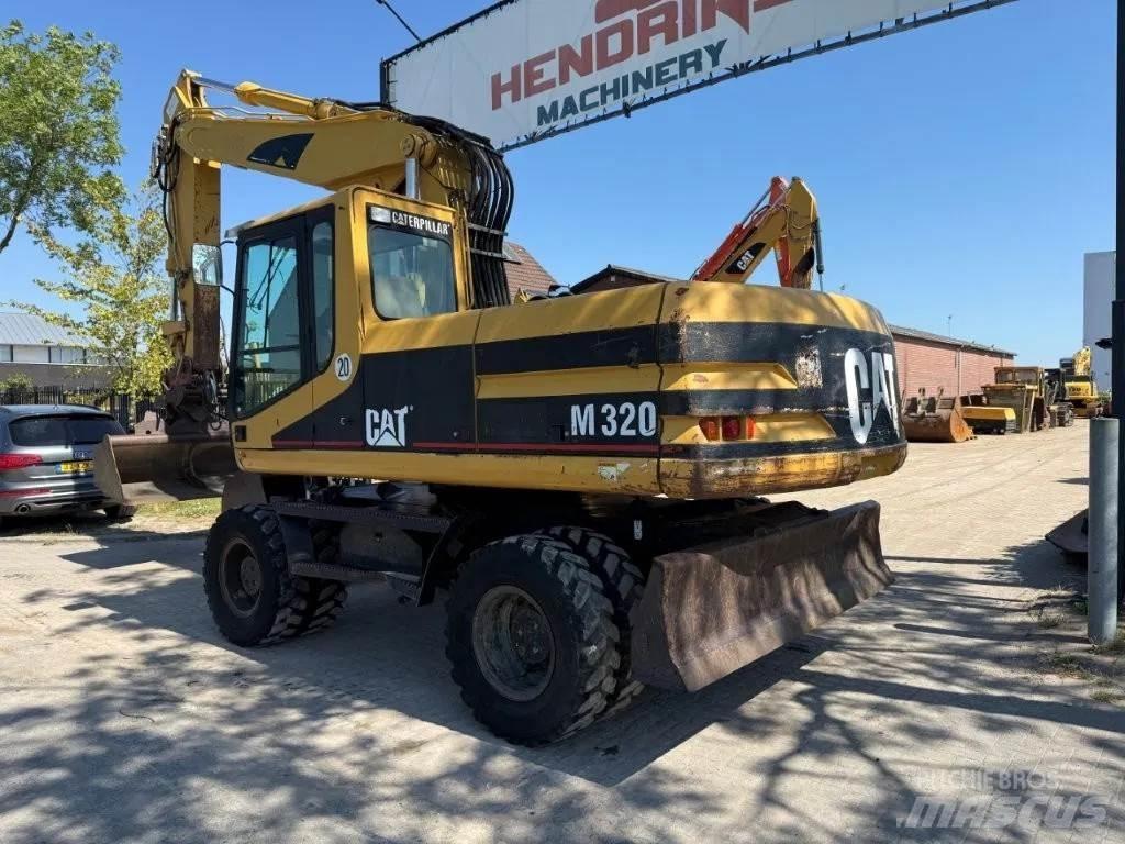 CAT M320 2001 Hjulgravere