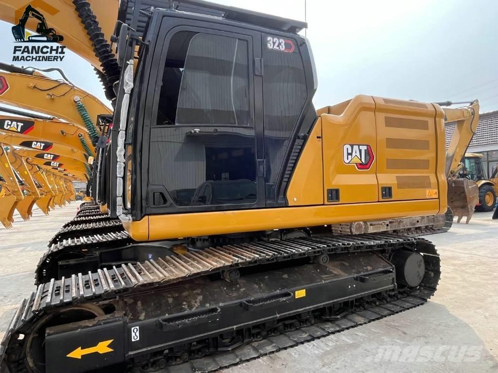 CAT 323 Beltegraver
