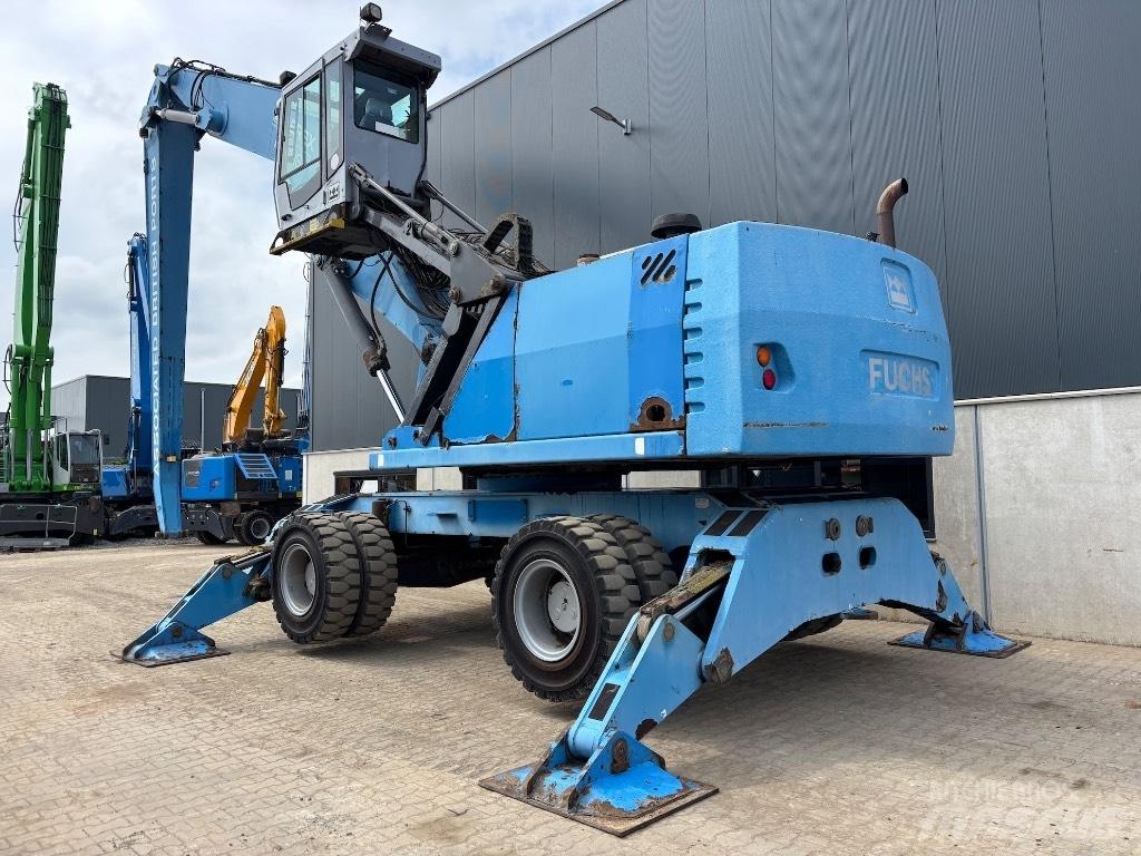 Fuchs MHL 380 Gravemaskiner for avfallshåndtering