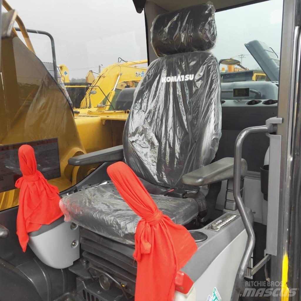 Komatsu PC200-8 Beltegraver