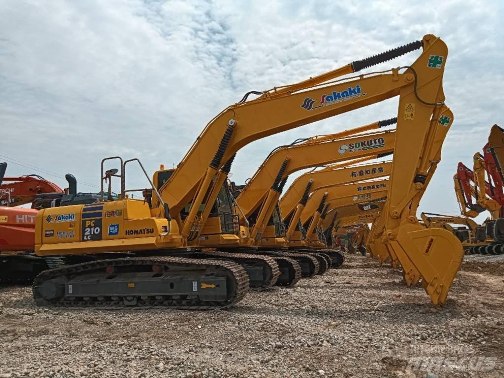 Komatsu PC 210LC Beltegraver