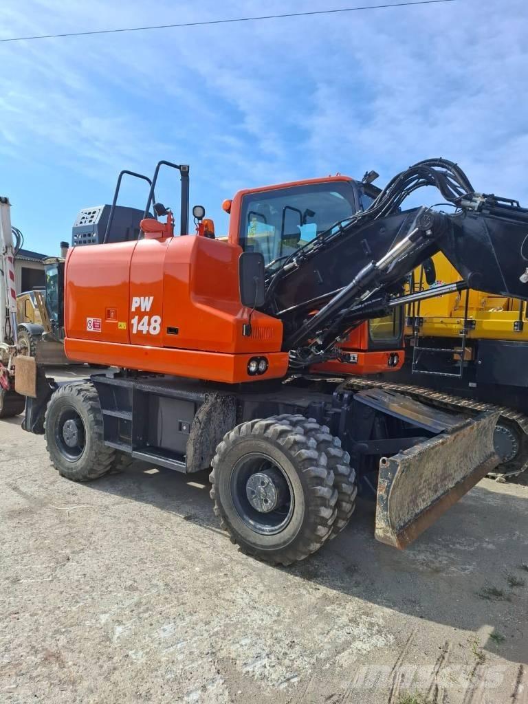 Komatsu PW 148-11 Hjulgravere