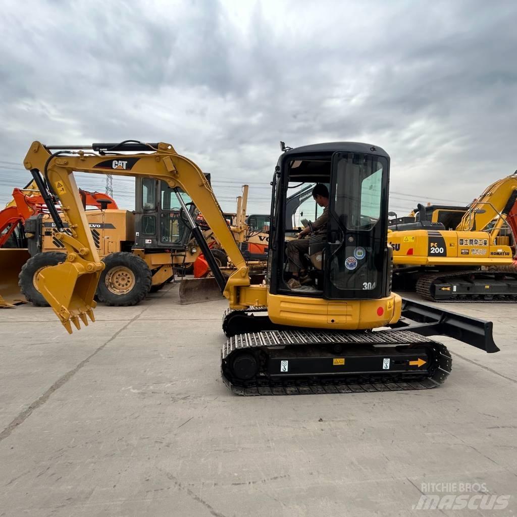 CAT 304 Beltegraver