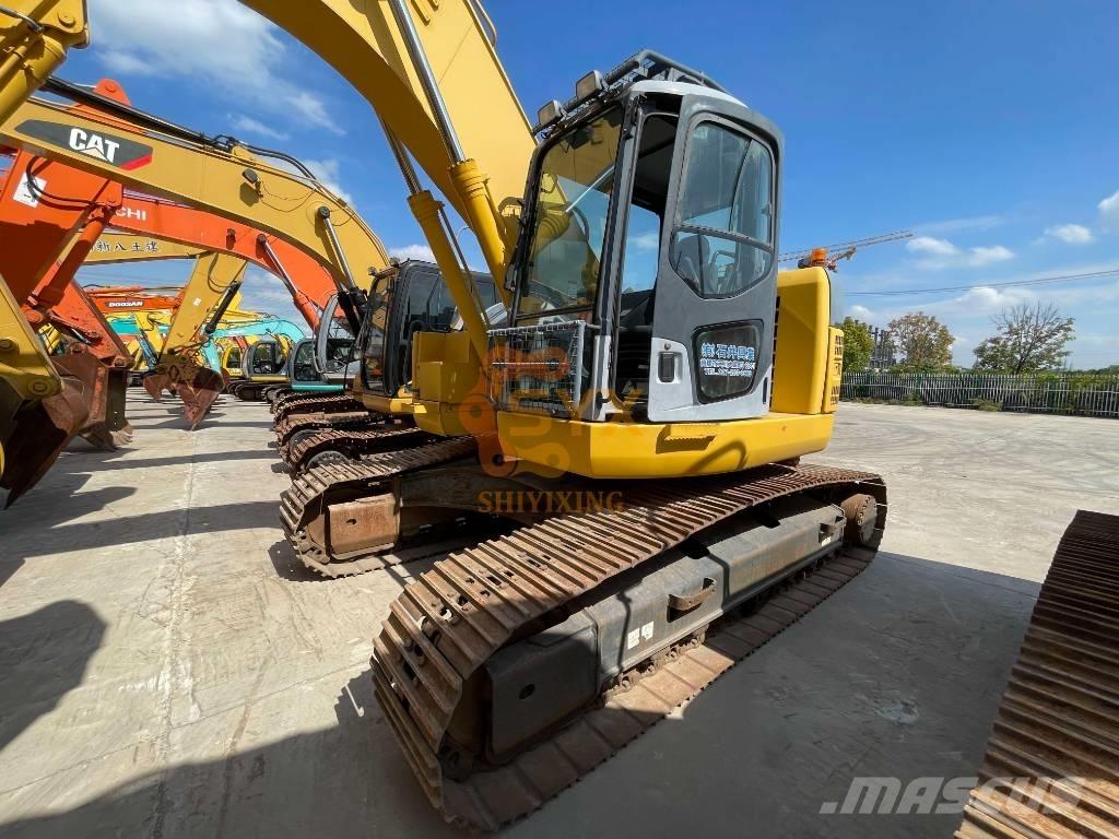Komatsu PC 228 US Beltegraver
