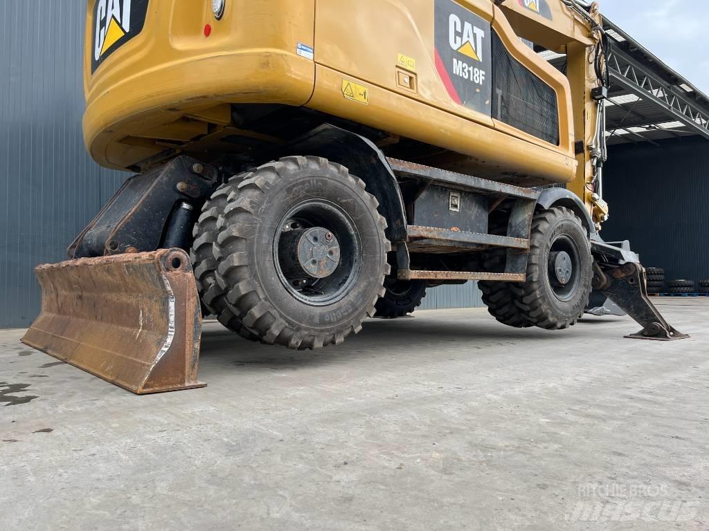 CAT M318F Hjulgravere